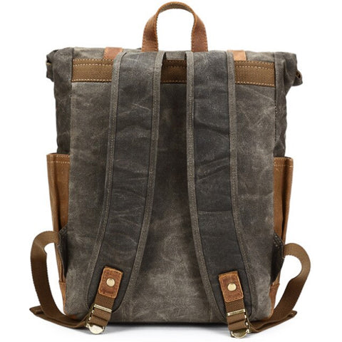 Close-up of front pocket details on the vintage water-resistant backpack