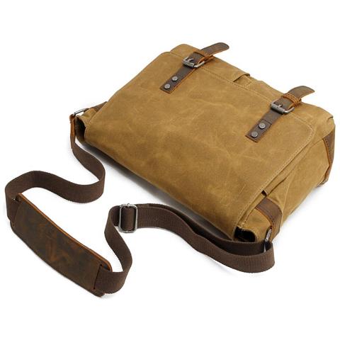 Vintage crossbody bag for men styled upright to highlight compact everyday design