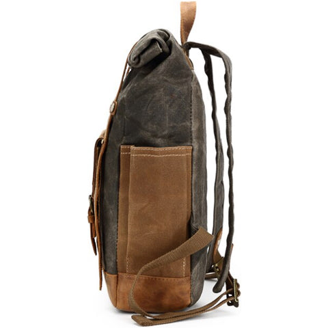 Top handle and zipper detail on the vintage water-resistant backpack