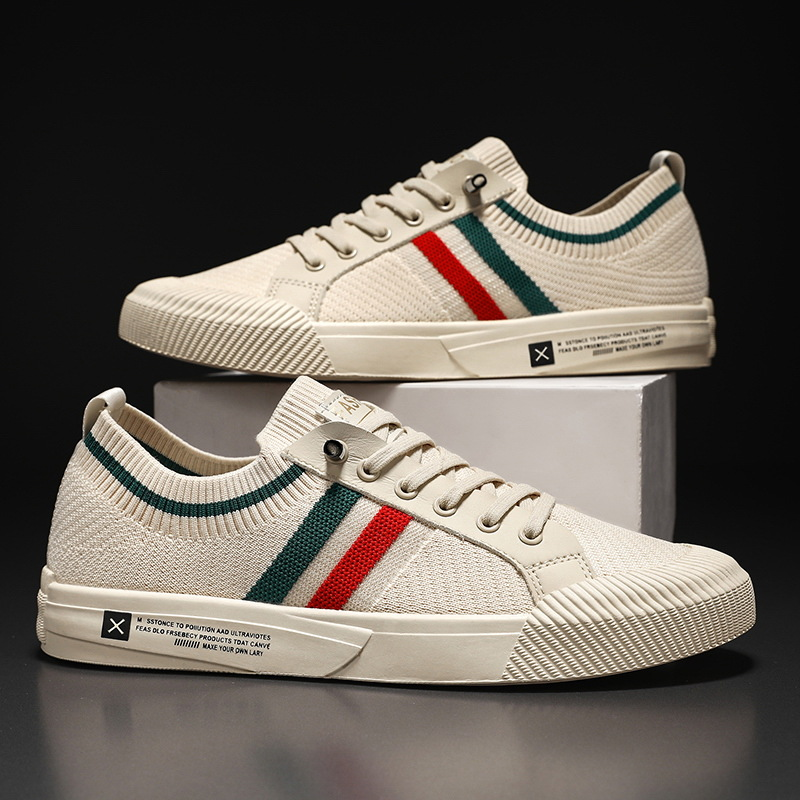 Pair of men's mesh sneakers shown from the side
