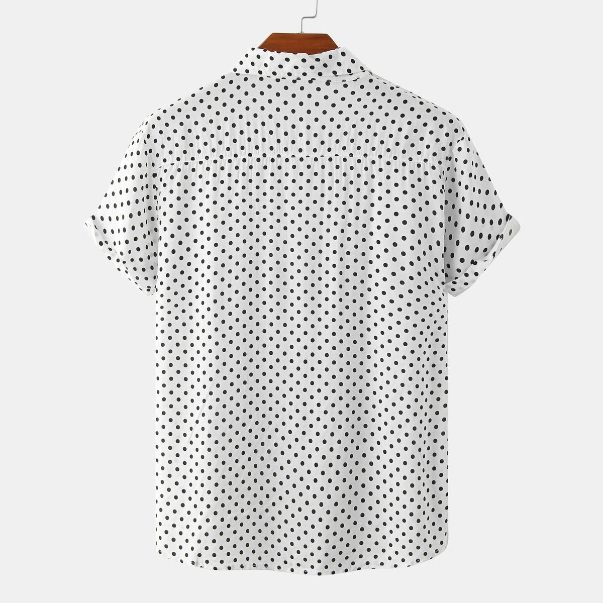 Detail of the collar on a men's short-sleeve dot shirt