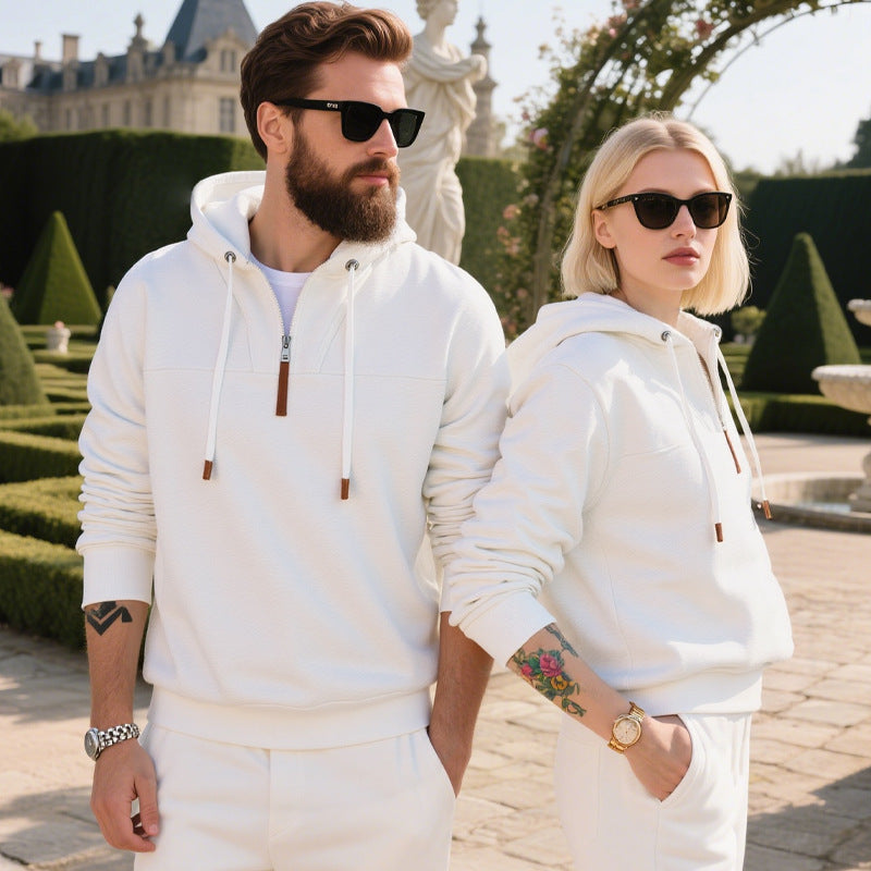 Front view of a men's fleece hoodie with a half-zip closure