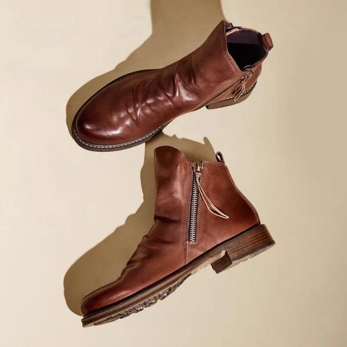 Men's boots displayed to show their sturdy sole