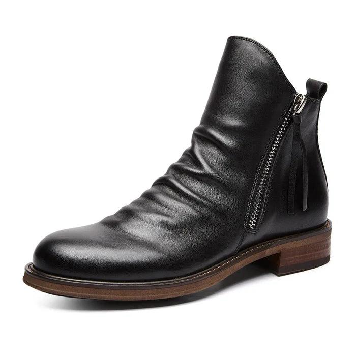 Pair of men's leather boots shown from the side