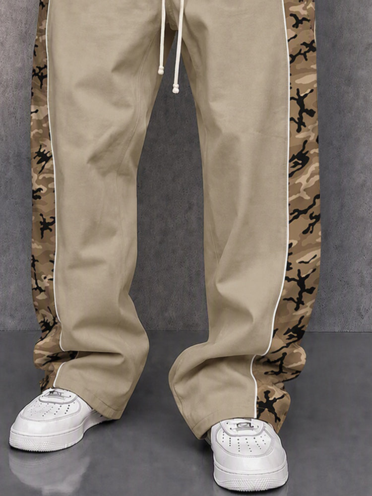 Men's camouflage patchwork pants styled for an urban casual outfit