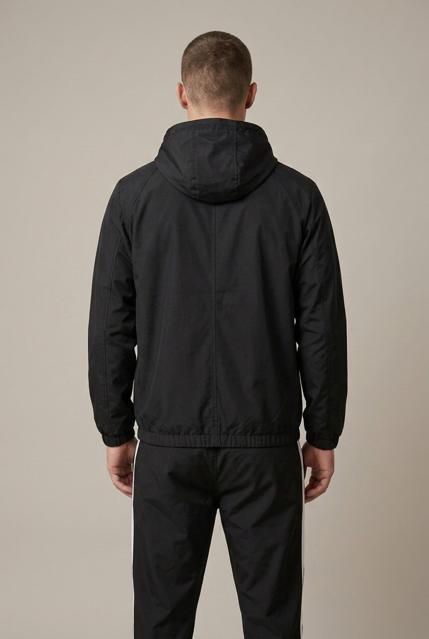 Men's jogger set featuring a hooded track jacket and tapered pants