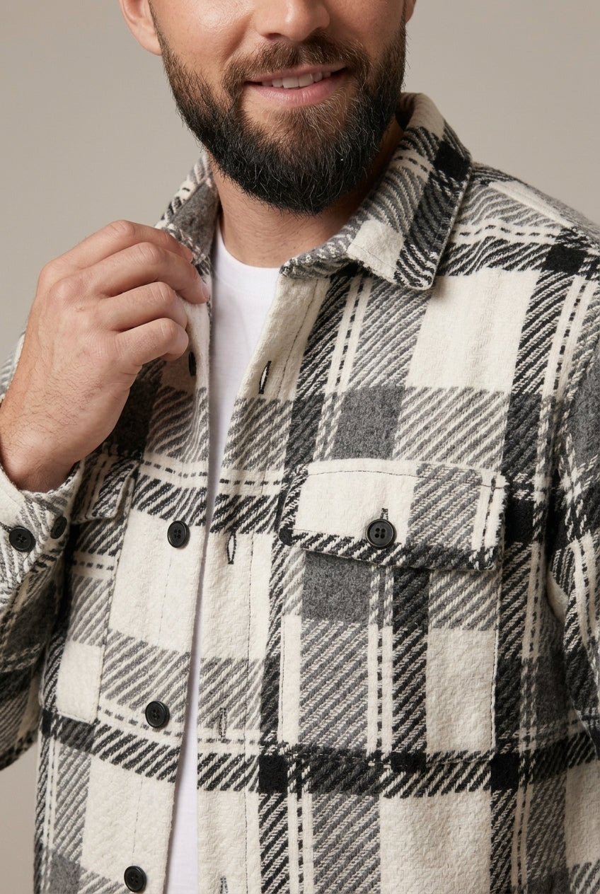 Front view of men's checked overshirt with a relaxed silhouette