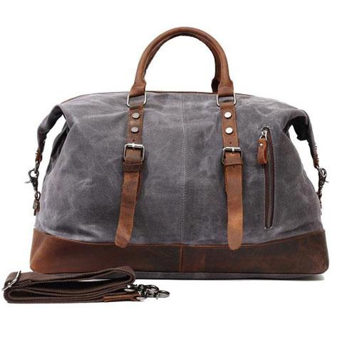 Top view of the leather duffle bag showing zipper closure and handles