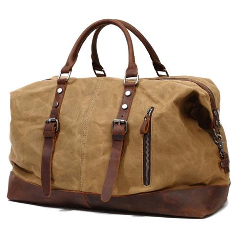 Vintage leather duffle bag angled to show the front and side profile