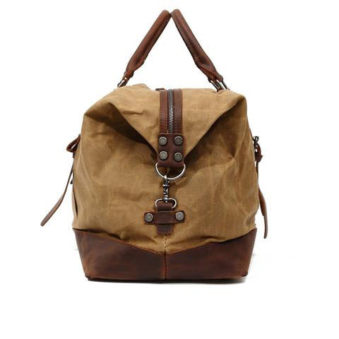Close-up of vintage leather texture and stitching on the duffle bag