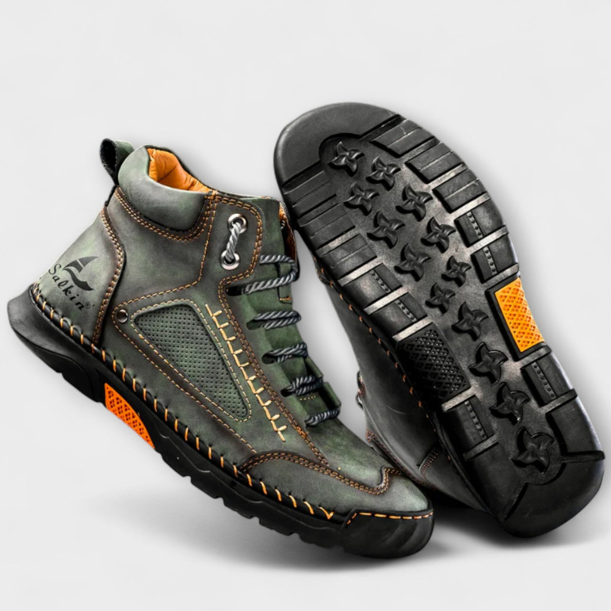 Close-up view of men's leather boots highlighting the leather upper