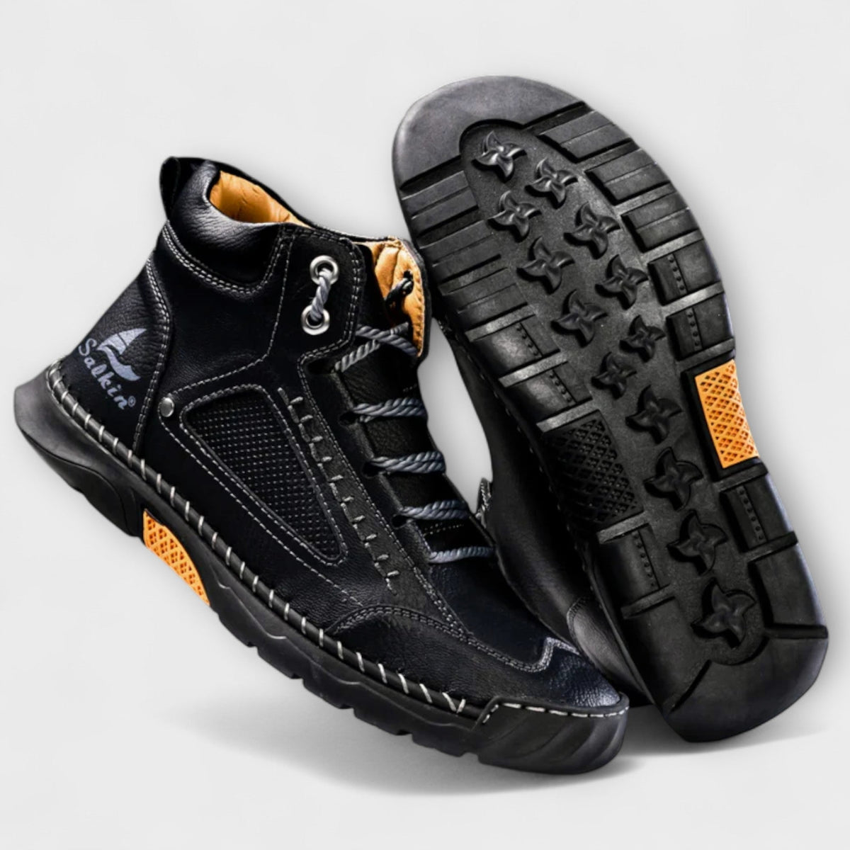 Men's leather boots shown together for a coordinated footwear look