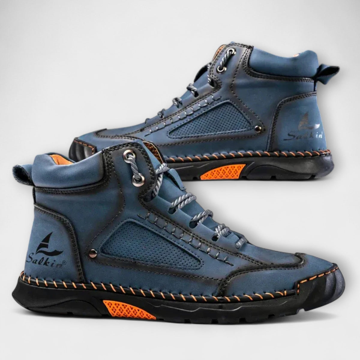 Detailed view of the stitching and leather construction on men's boots