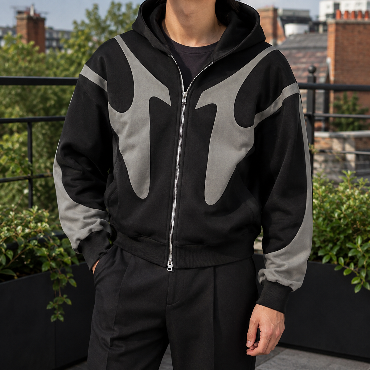 Men's contrast zip hoodie shown from the front with a full zip closure and hood