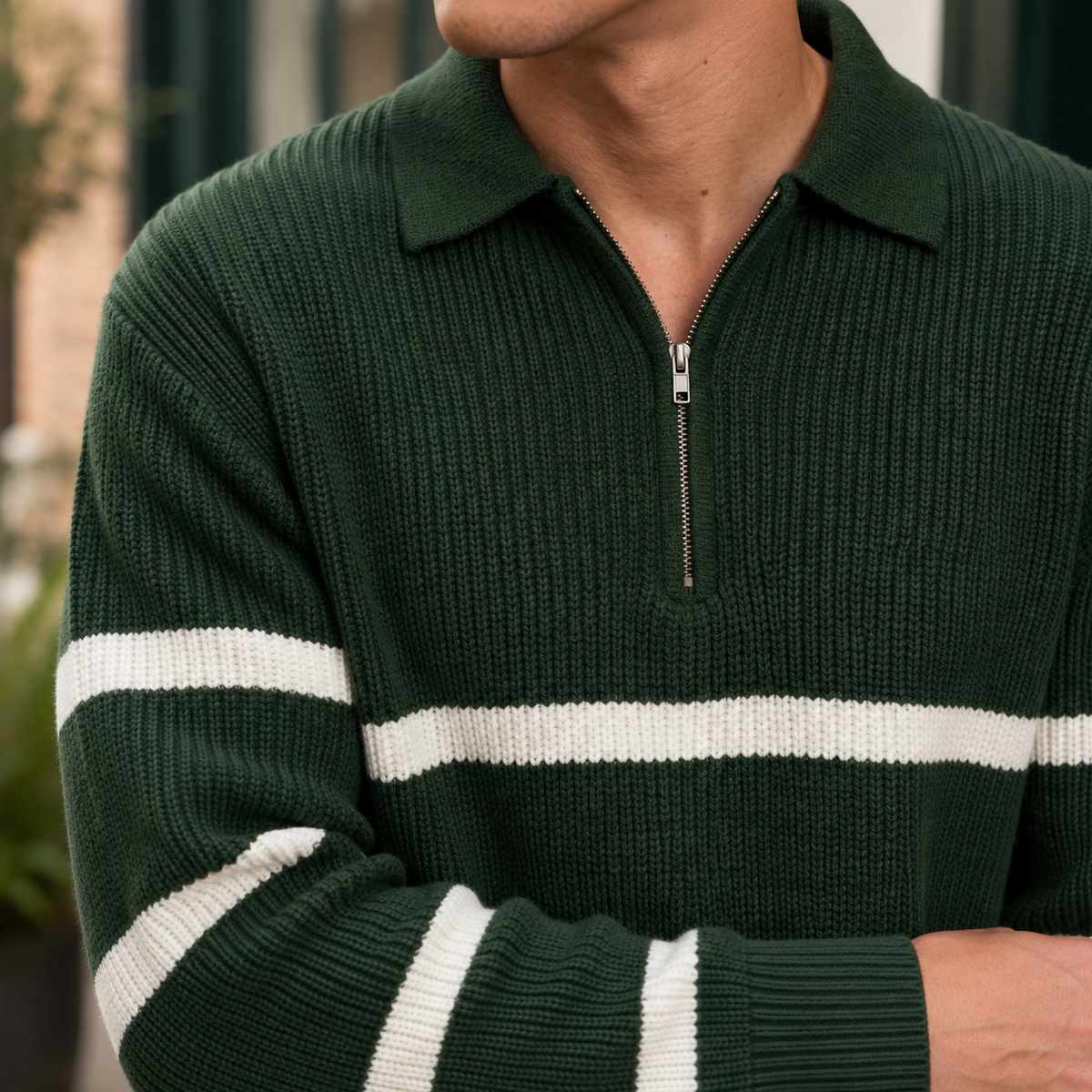 Close-up of the ribbed knit texture and half-zip collar