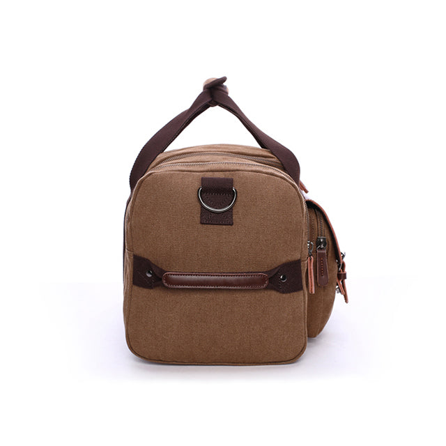 Leather canvas weekender bag with dual handles and detachable shoulder strap