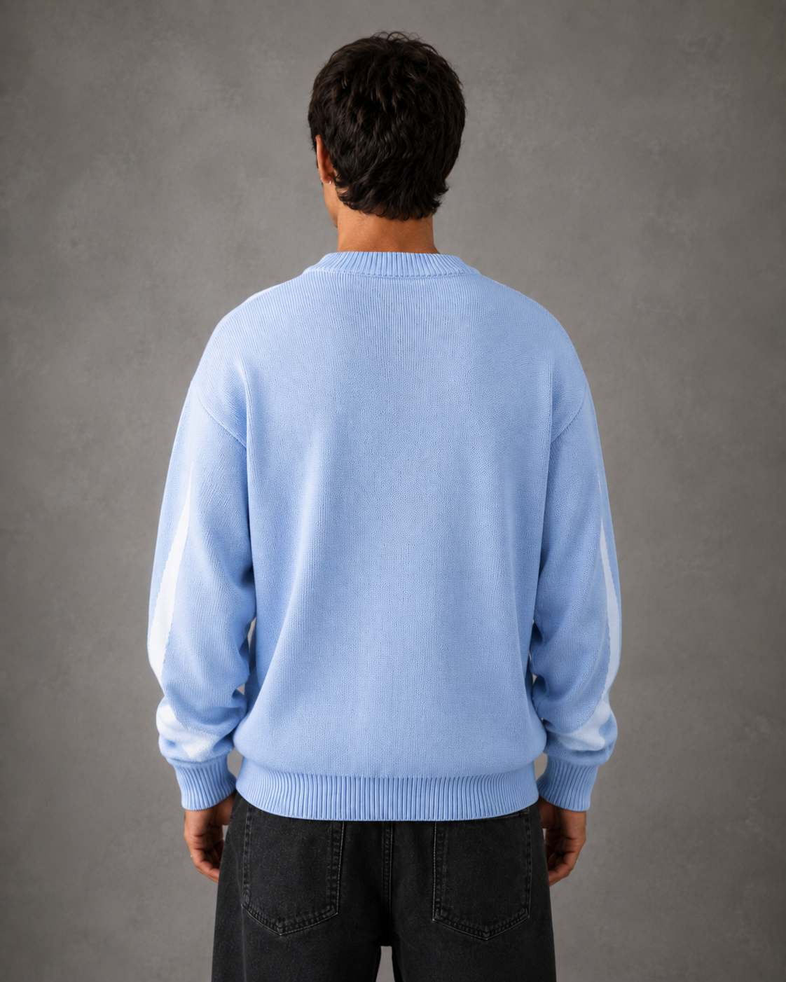 Relaxed crew neck graphic sweater styled for men's streetwear