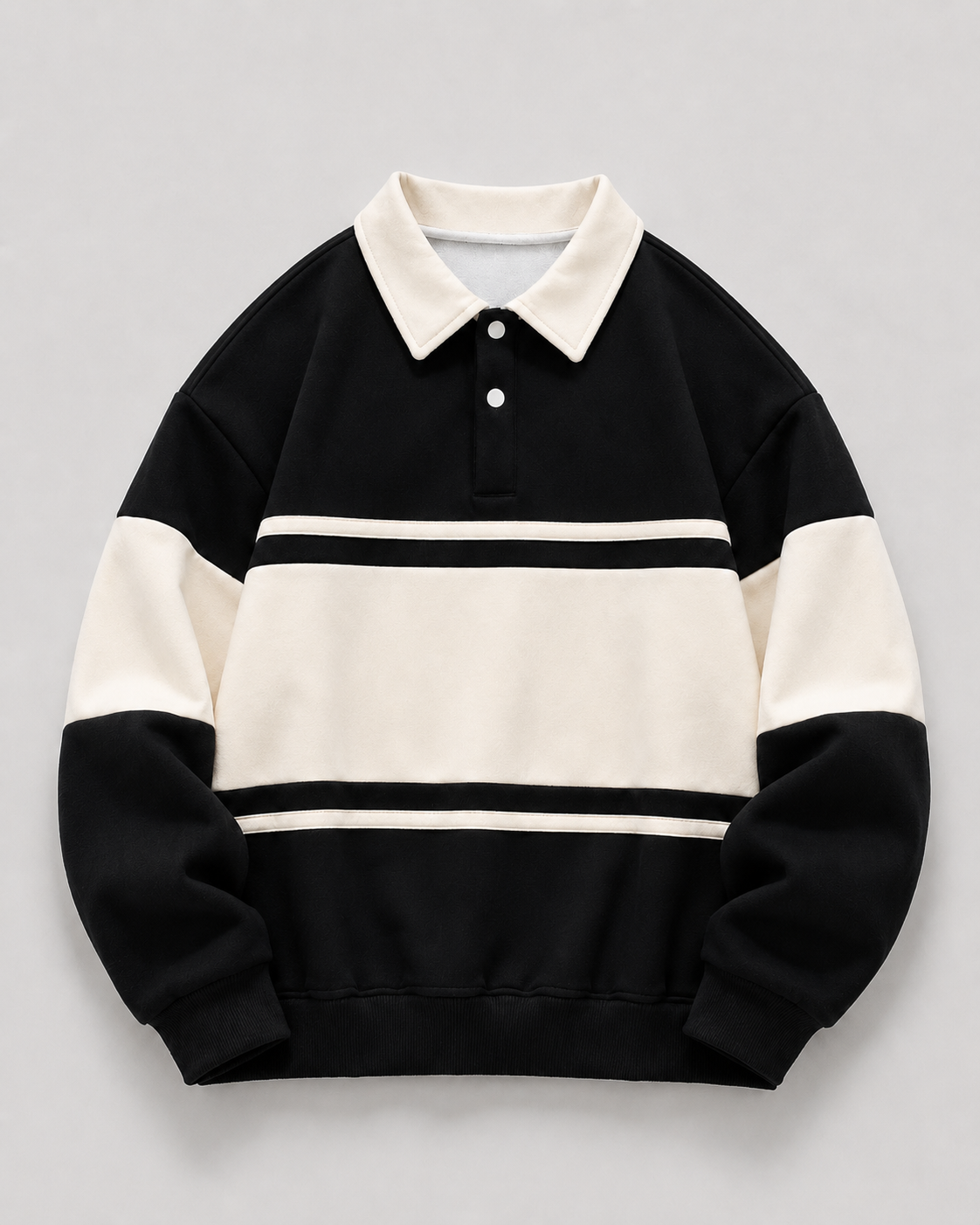Detailed view of the ribbed cuffs on a men's polo sweater
