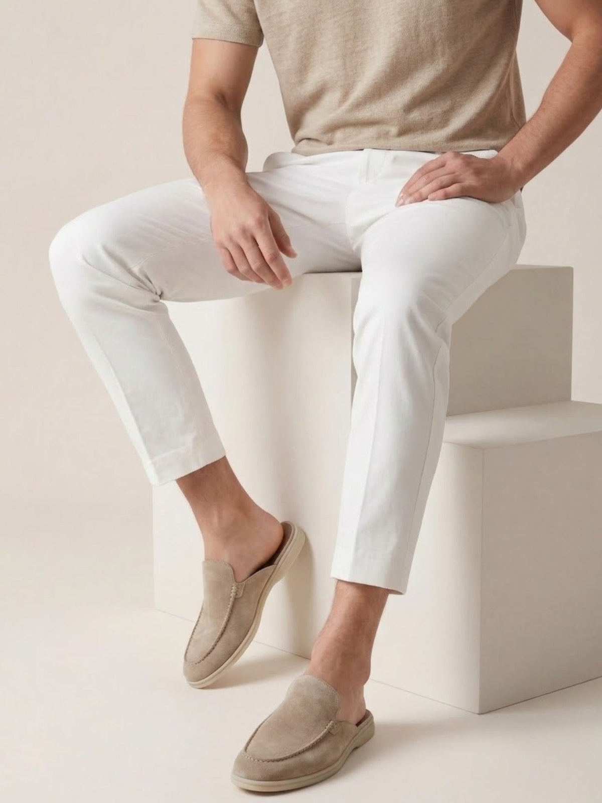 Pair of men's casual mules shown from a front angle