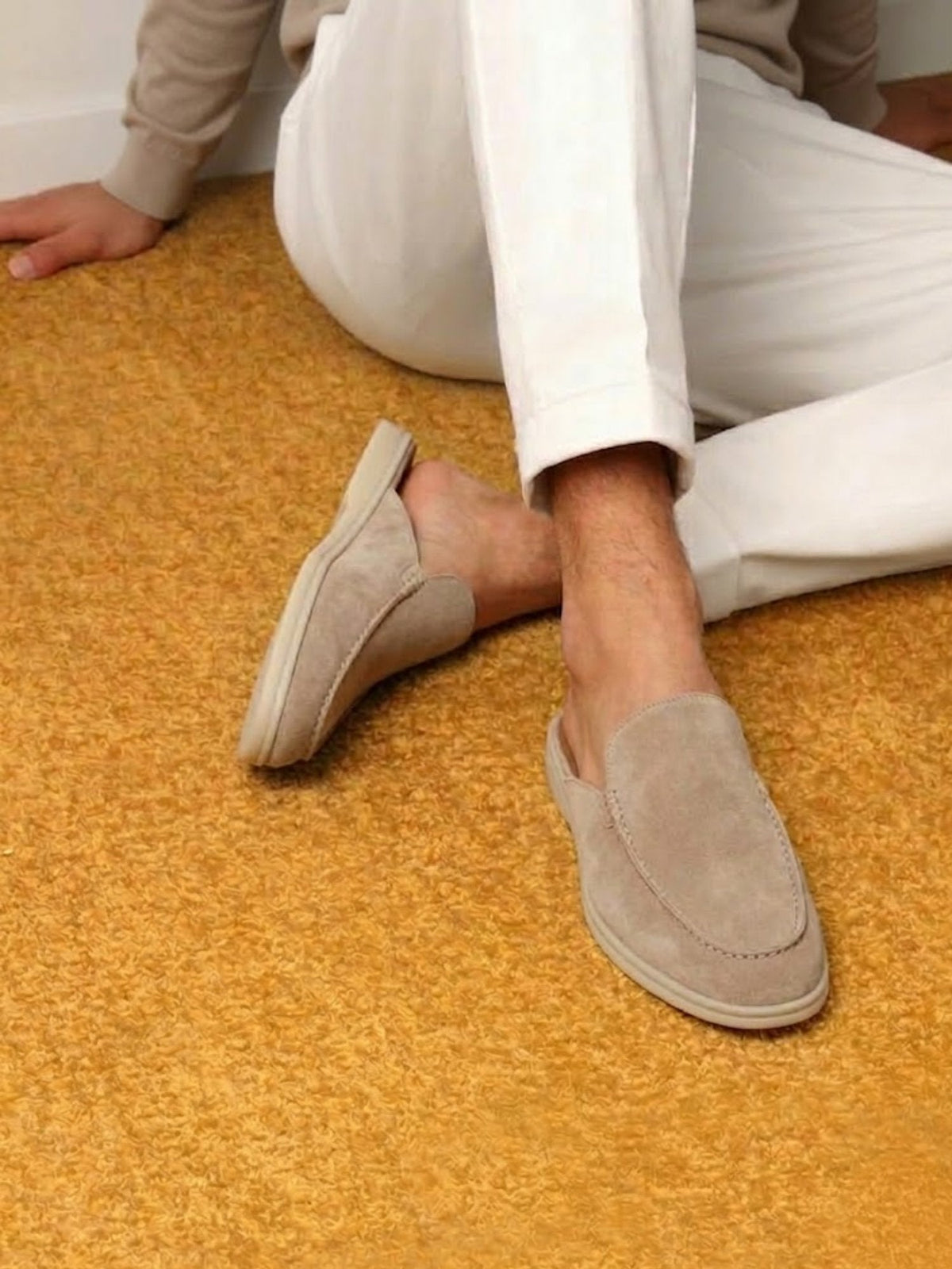 Side view of men's slip-on mules with a backless design