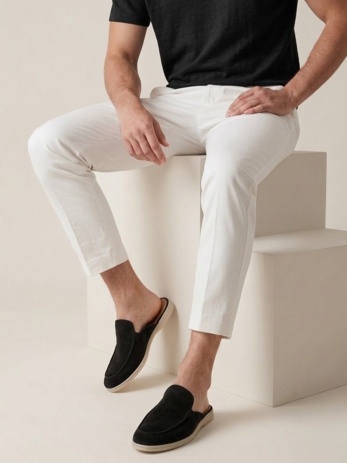 Close-up of stitched detail on men's slip-on mules