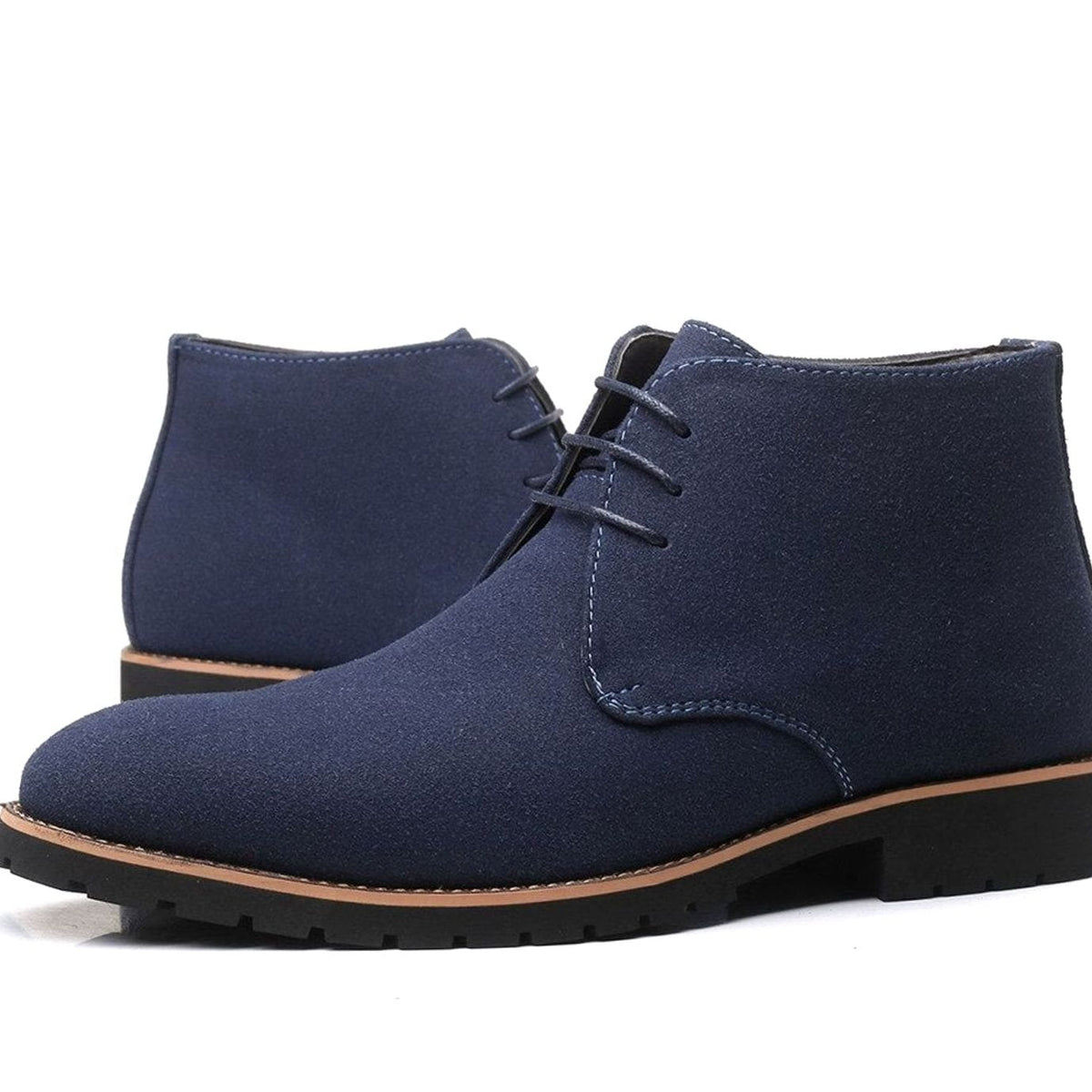 Pair of men's suede ankle boots displayed against a clean background
