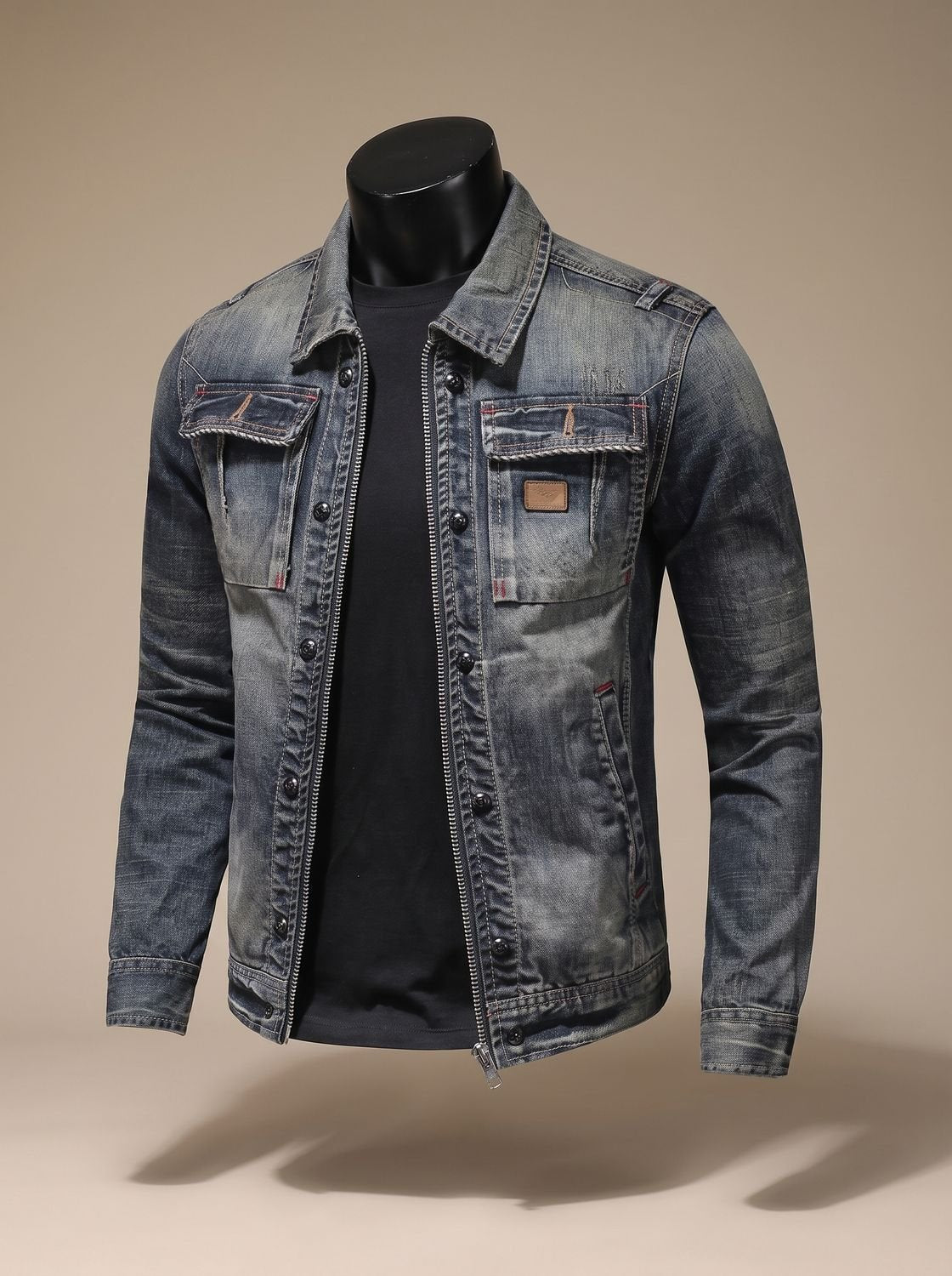 Side view of the men's denim trucker jacket showing its structured fit