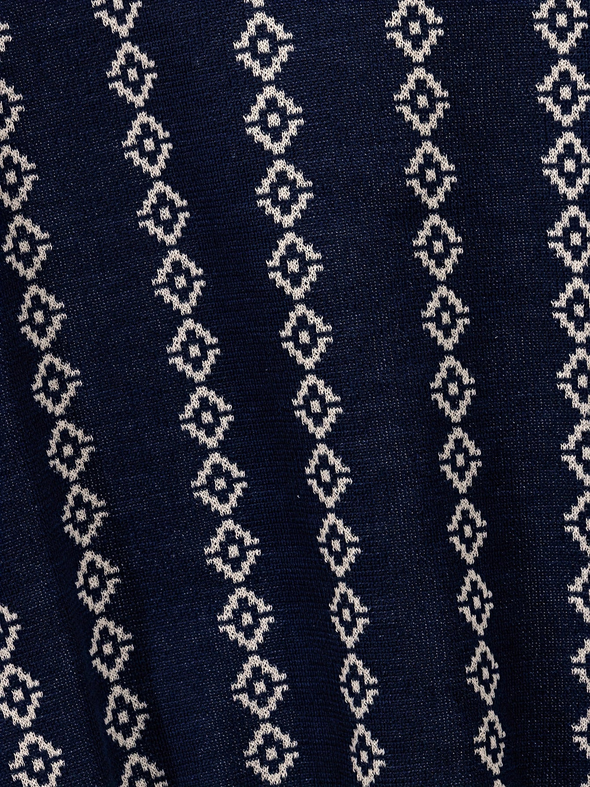 Detailed view of the sweater's neckline and shoulders