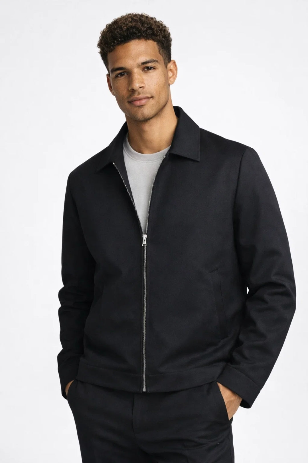 Men's padded longline coat shown from the front with a refined, elegant design.