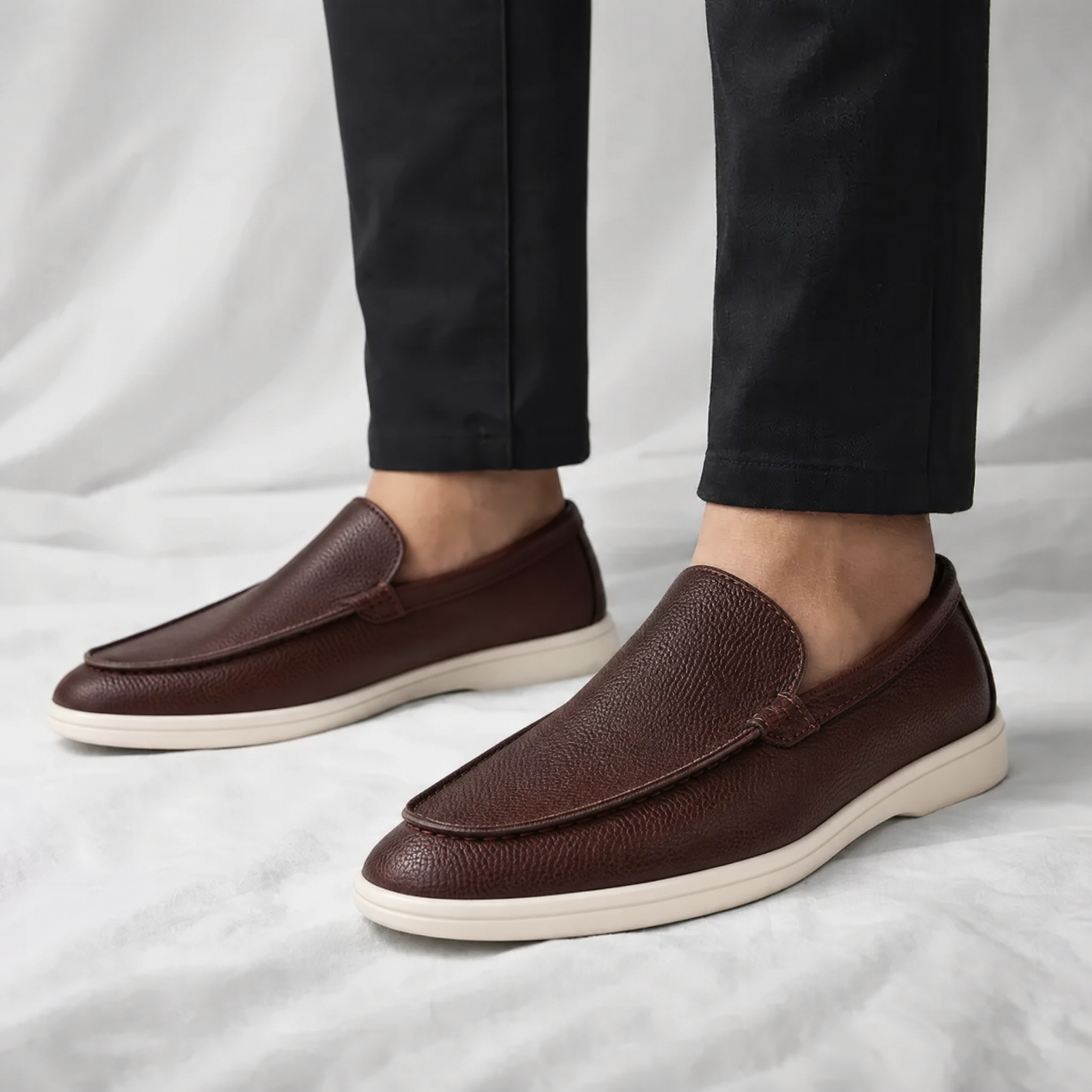 Side view of classic men's leather slip-on loafers