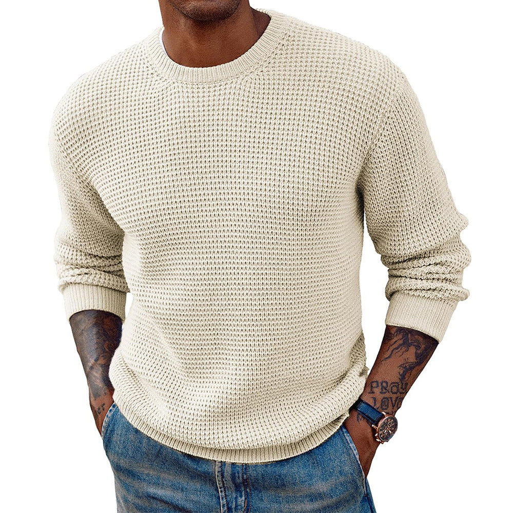 Detailed view of the sweater's crew neckline and ribbed knit fabric