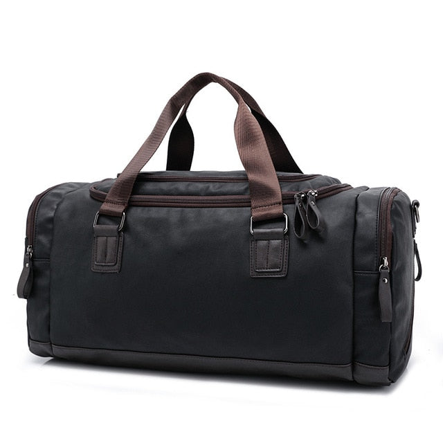 Men's leather travel duffel bag shown from the front with dual handles and zip top